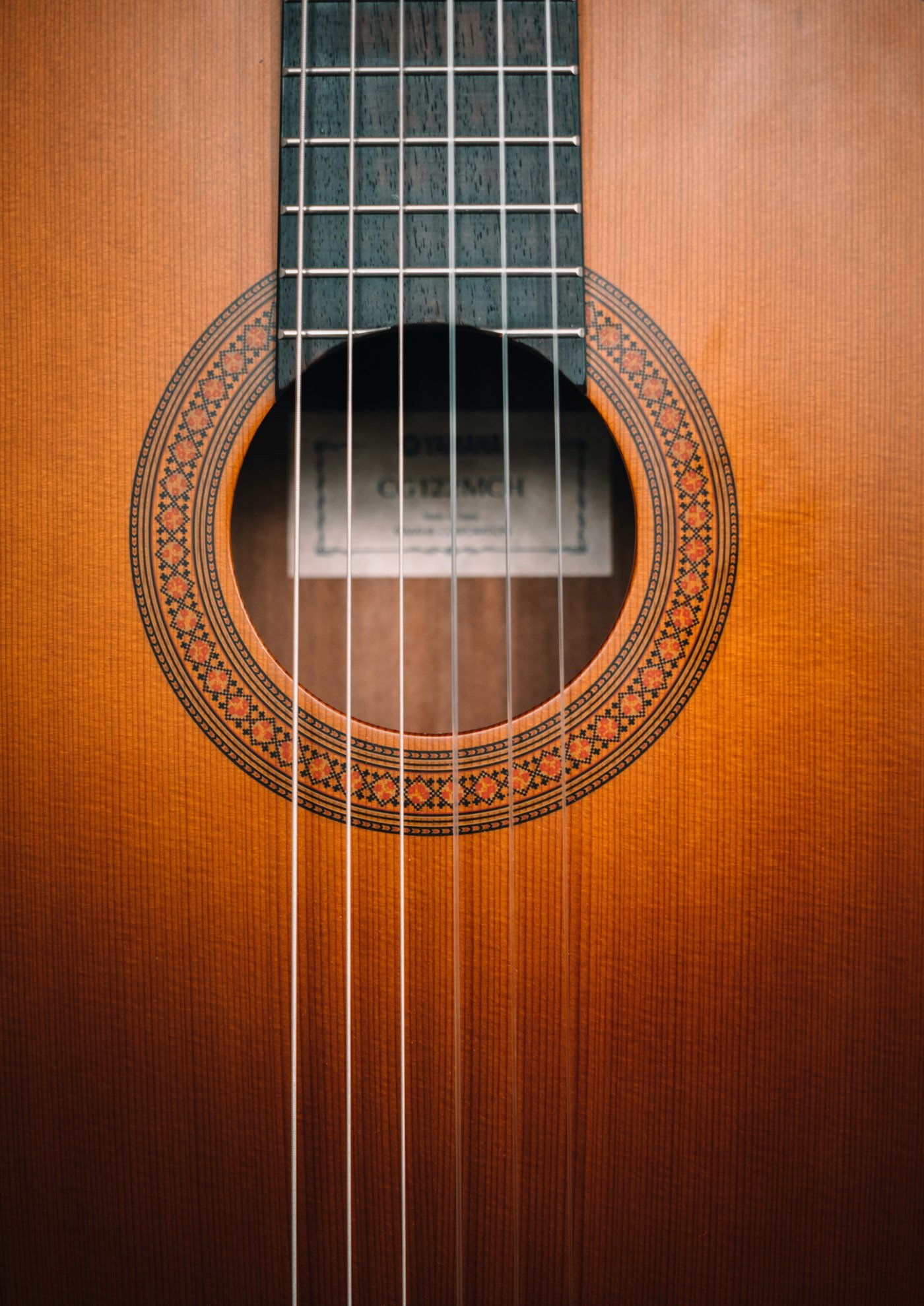 Close-up of a classical guitar soundhole and rosette