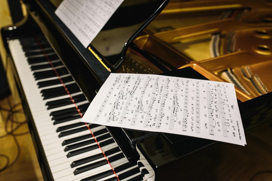 Sheet music resting on a grand piano