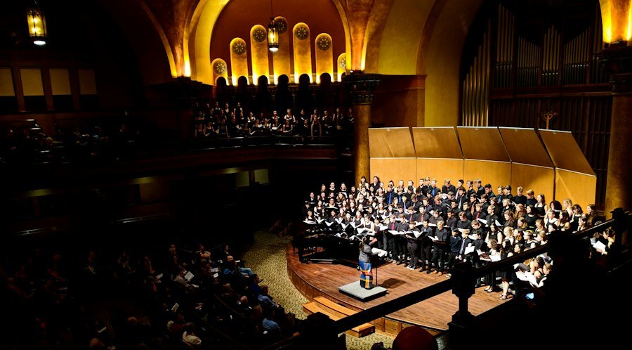 Choir performing in a concert hall