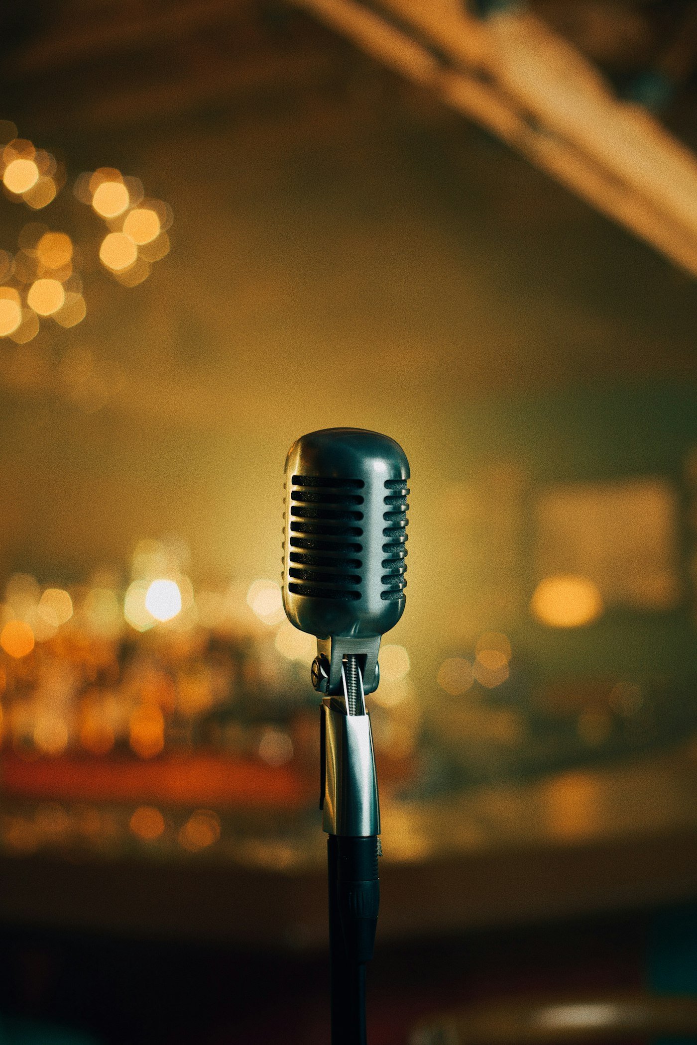 Vintage microphone with warm stage lights
